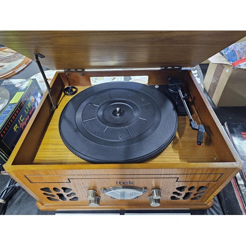 98 - A modern retro style Itek record player with built in radio CD and cassette player, in working order... 