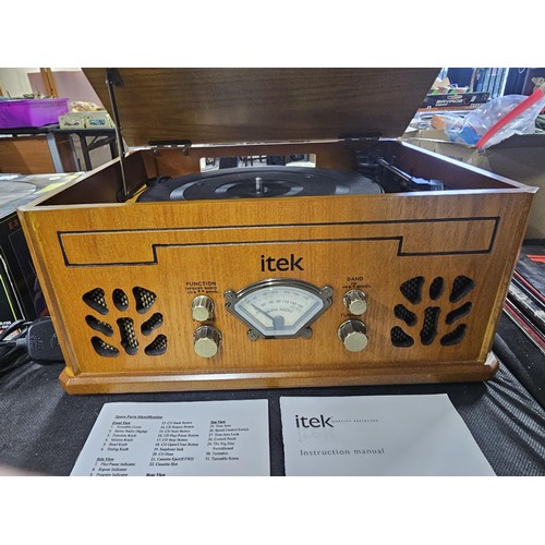 98 - A modern retro style Itek record player with built in radio CD and cassette player, in working order... 