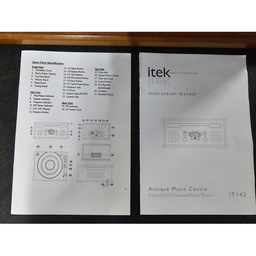 98 - A modern retro style Itek record player with built in radio CD and cassette player, in working order... 