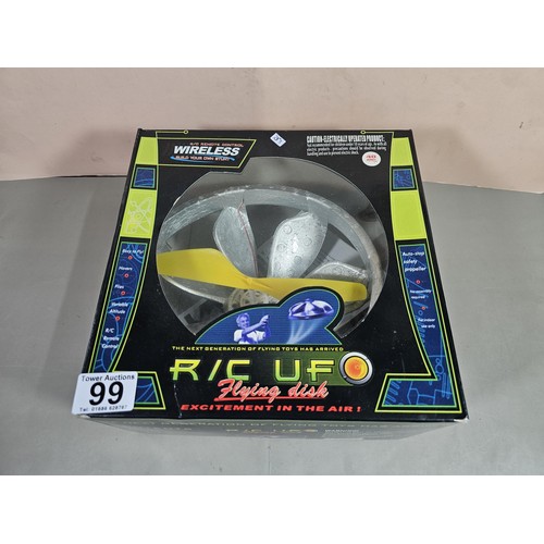 99 - A boxed radio controlled flying saucer in an original box, the propeller is set in a foam housing, c... 