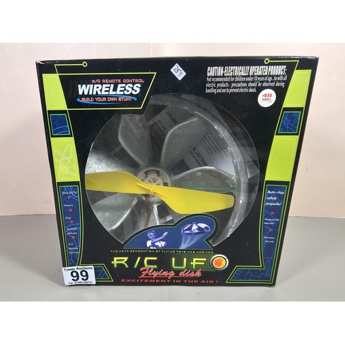 99 - A boxed radio controlled flying saucer in an original box, the propeller is set in a foam housing, c... 