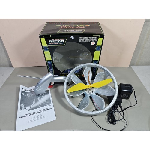 99 - A boxed radio controlled flying saucer in an original box, the propeller is set in a foam housing, c... 