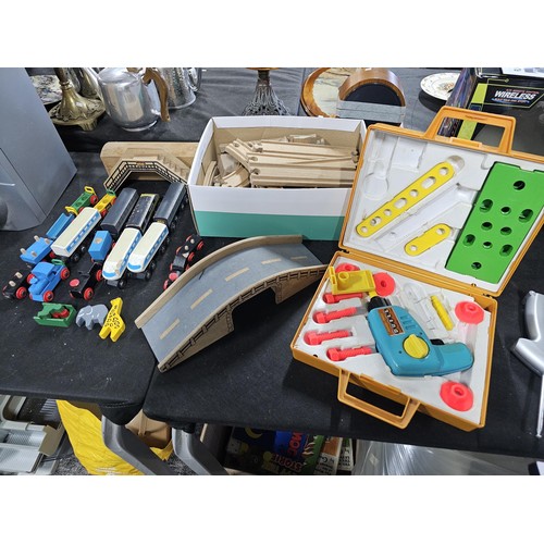 100 - Quantity of wooden children's railway set with wooden track and trains along with a bridge and a Fis... 