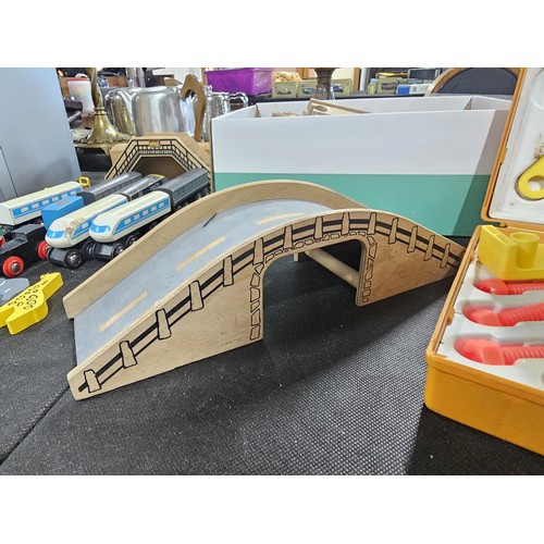 100 - Quantity of wooden children's railway set with wooden track and trains along with a bridge and a Fis... 