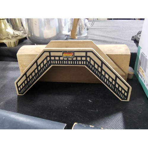 100 - Quantity of wooden children's railway set with wooden track and trains along with a bridge and a Fis... 