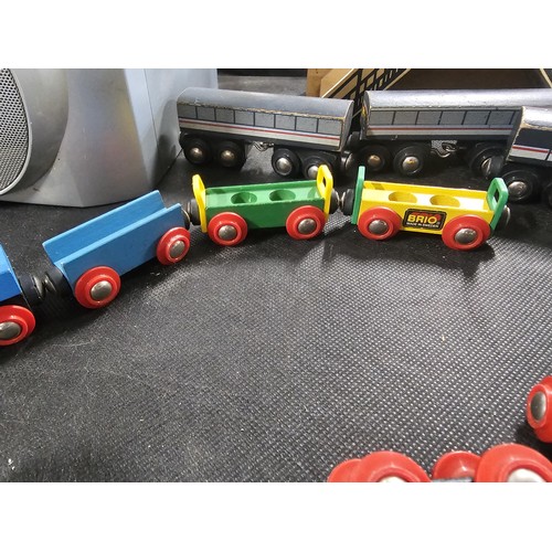 100 - Quantity of wooden children's railway set with wooden track and trains along with a bridge and a Fis... 