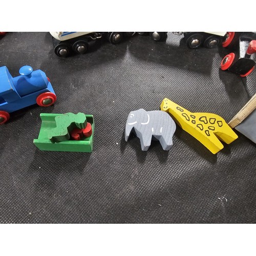 100 - Quantity of wooden children's railway set with wooden track and trains along with a bridge and a Fis... 