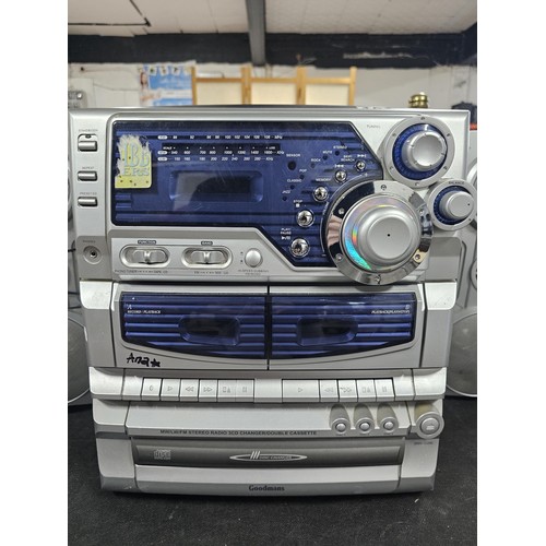 101 - A good quality Goodmans 3 disc autochanger with a 3 band radio 2x cassette decks along with speakers... 