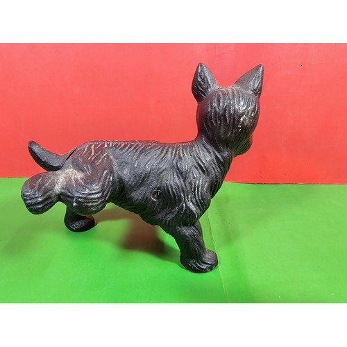 103A - 2x good quality vintage cast iron door stops to include one in the form of a dog cocking its leg and... 