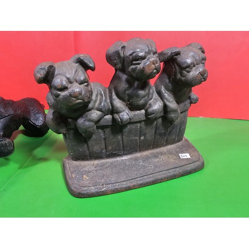 103A - 2x good quality vintage cast iron door stops to include one in the form of a dog cocking its leg and... 