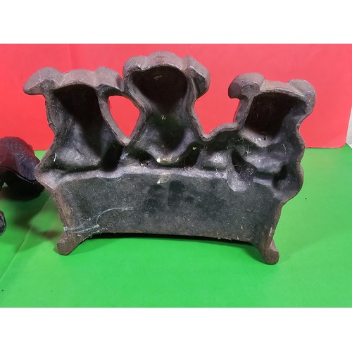 103A - 2x good quality vintage cast iron door stops to include one in the form of a dog cocking its leg and... 