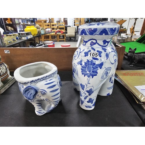 105 - 2x blue and white ceramic elephant items to include a blue and white jardiniere stand along with a p... 