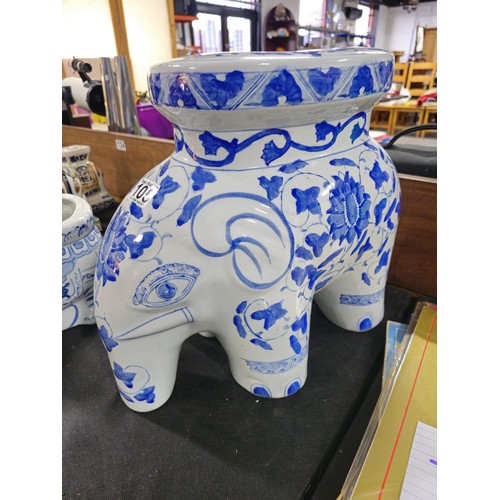 105 - 2x blue and white ceramic elephant items to include a blue and white jardiniere stand along with a p... 
