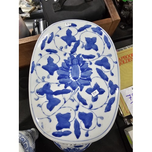 105 - 2x blue and white ceramic elephant items to include a blue and white jardiniere stand along with a p... 