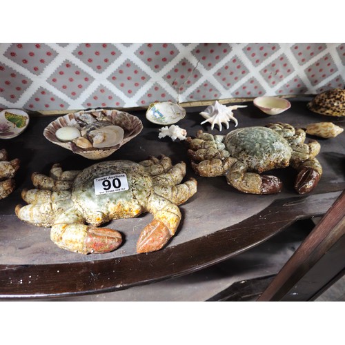 90 - A quantity of collectables to include 3x pottery wall hanging crabs a collection of collectable shel... 