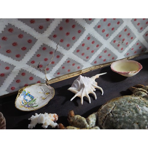 90 - A quantity of collectables to include 3x pottery wall hanging crabs a collection of collectable shel... 