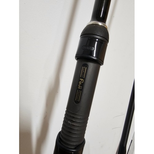 94 - A good quality 12ft long 2 section carp fishing rod in good order with a carryall harness by Fuji Gu... 