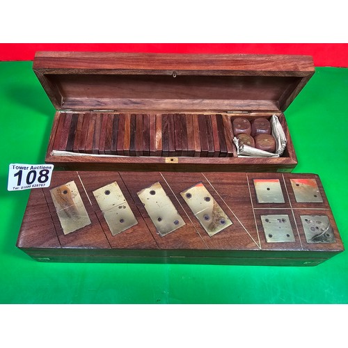 108 - 2x boxed sets of dominoes in good order with brass effects showing dominoes both are complete