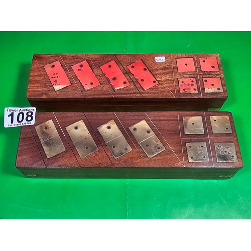 108 - 2x boxed sets of dominoes in good order with brass effects showing dominoes both are complete