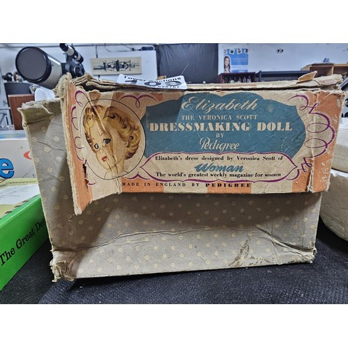 109 - A good quality boxed Elizabeth Dress Making Doll, by Pedigree, tilted the Veronica Scott, Doll is in... 
