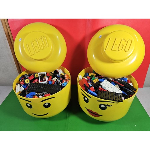 114 - 2x original Lego containers in the form of Lego heads both full of Lego pieces along with 3x jigsaws... 