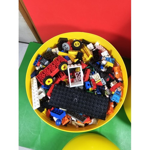 114 - 2x original Lego containers in the form of Lego heads both full of Lego pieces along with 3x jigsaws... 