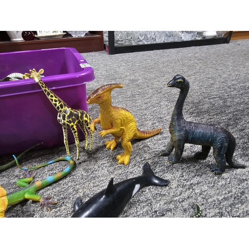 113 - Collection of rubber and plastic toys in the form of dinosaurs and zoo animals to include an articul... 