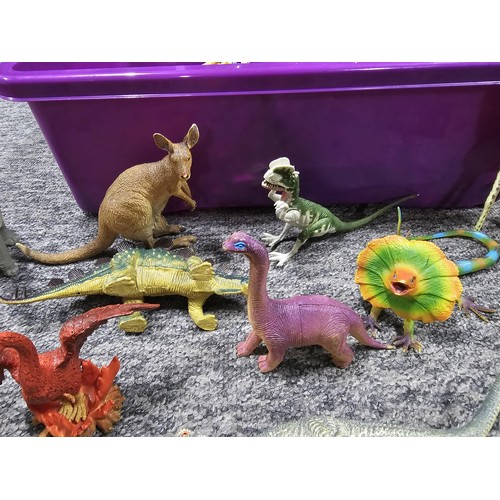 113 - Collection of rubber and plastic toys in the form of dinosaurs and zoo animals to include an articul... 