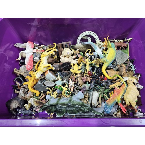 113 - Collection of rubber and plastic toys in the form of dinosaurs and zoo animals to include an articul... 