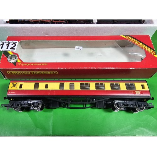 112 - 2x boxed Hornby train and carriage to include a 4-6-2 Class 7 Britannia loco and tender in british r... 