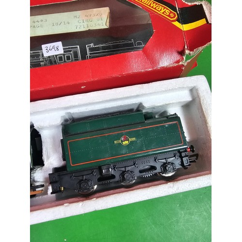 112 - 2x boxed Hornby train and carriage to include a 4-6-2 Class 7 Britannia loco and tender in british r... 