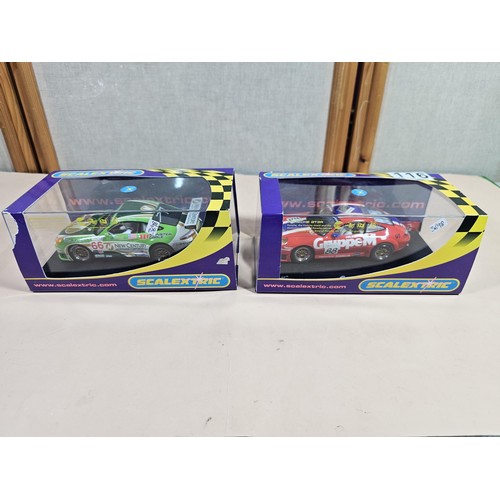 116 - 2x original boxed Scalextric cars in the form of Porsche, in plastic cases, both are in good order c... 