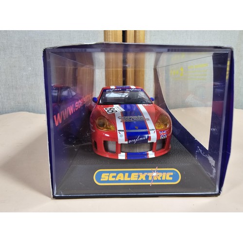116 - 2x original boxed Scalextric cars in the form of Porsche, in plastic cases, both are in good order c... 