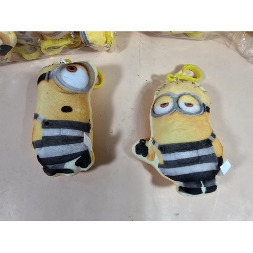 115 - Collection of Minion style key ring in the form of a small yellow plush toy with a plastic fastener,... 