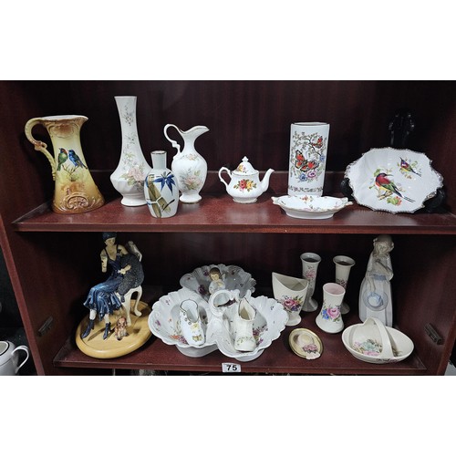 75 - A large collection of assorted ceramics to include a trefoil dish, a Goebel angel figure, a Nadal la... 