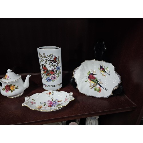 75 - A large collection of assorted ceramics to include a trefoil dish, a Goebel angel figure, a Nadal la... 