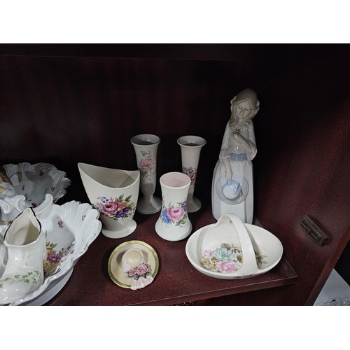 75 - A large collection of assorted ceramics to include a trefoil dish, a Goebel angel figure, a Nadal la... 
