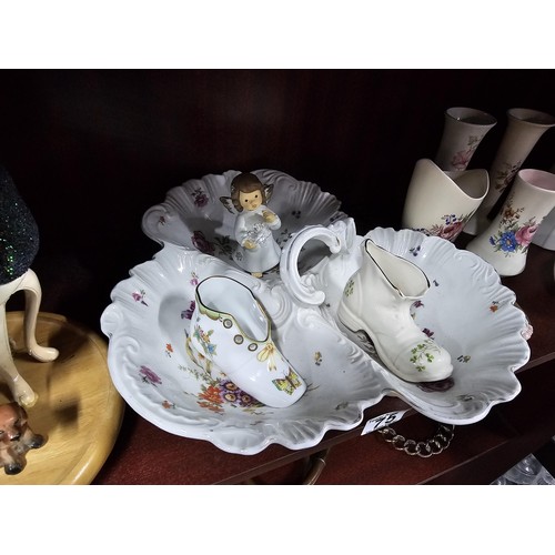 75 - A large collection of assorted ceramics to include a trefoil dish, a Goebel angel figure, a Nadal la... 