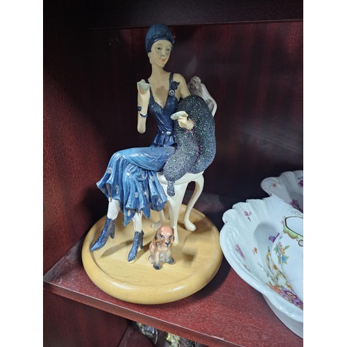 75 - A large collection of assorted ceramics to include a trefoil dish, a Goebel angel figure, a Nadal la... 