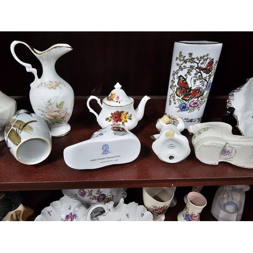75 - A large collection of assorted ceramics to include a trefoil dish, a Goebel angel figure, a Nadal la... 