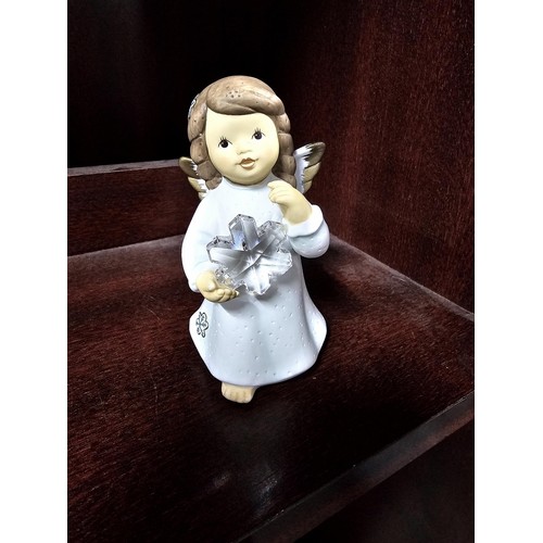 75 - A large collection of assorted ceramics to include a trefoil dish, a Goebel angel figure, a Nadal la... 