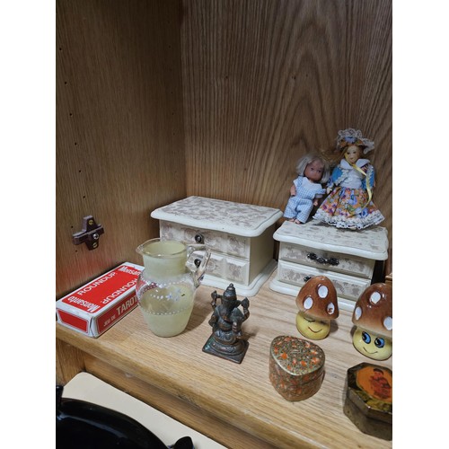 84 - A shelf full of collectables to include 2x white jewellery boxes along with a toadstool formed cruet... 