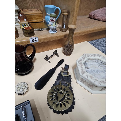84 - A shelf full of collectables to include 2x white jewellery boxes along with a toadstool formed cruet... 