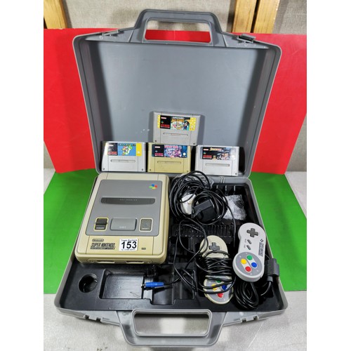 133 - A cased Super Nintendo Entertainment System in a rare Original Nintendo case, model number SNSP-001A... 
