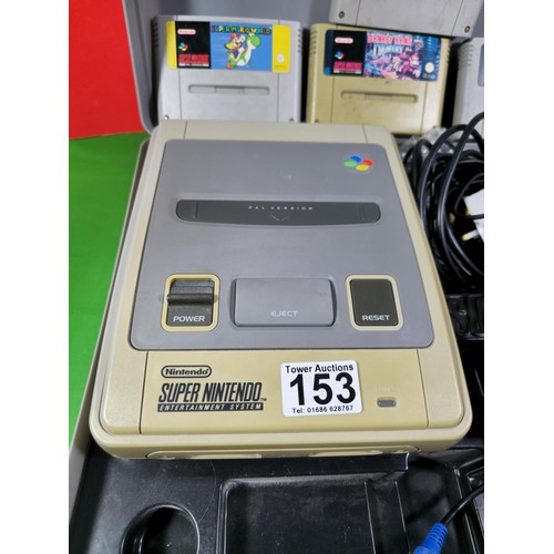 133 - A cased Super Nintendo Entertainment System in a rare Original Nintendo case, model number SNSP-001A... 