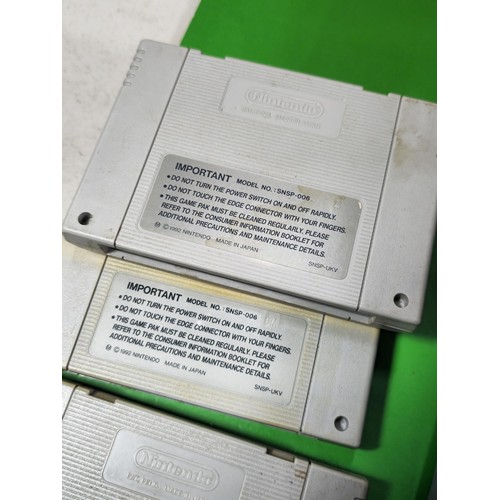 133 - A cased Super Nintendo Entertainment System in a rare Original Nintendo case, model number SNSP-001A... 