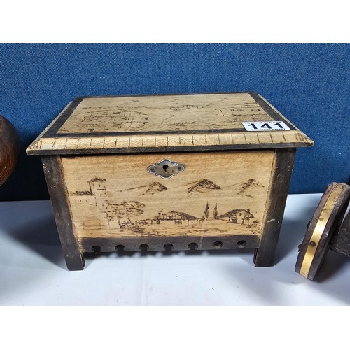 141 - A selection of wooden items to include a wooden hand turned bowl on a pedestal stand along with a wo... 