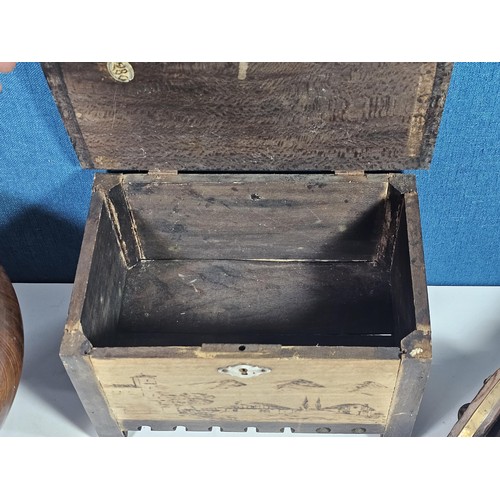 141 - A selection of wooden items to include a wooden hand turned bowl on a pedestal stand along with a wo... 