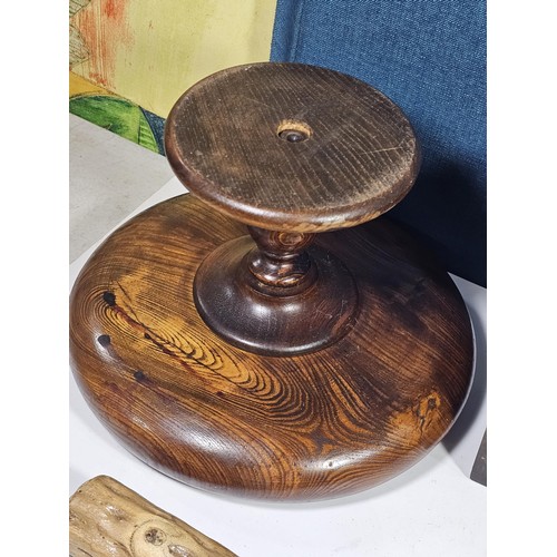 141 - A selection of wooden items to include a wooden hand turned bowl on a pedestal stand along with a wo... 