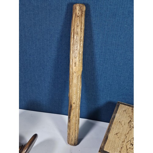 141 - A selection of wooden items to include a wooden hand turned bowl on a pedestal stand along with a wo... 